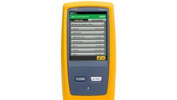 Front view of a yellow handheld cable tester with a digital display showing test results and a 'PASS' status, used for verifying network cable performance and certification.