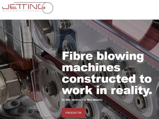 Frontpage of jetting.se. A fiber blowing machine with metallic rollers. Text overlay: