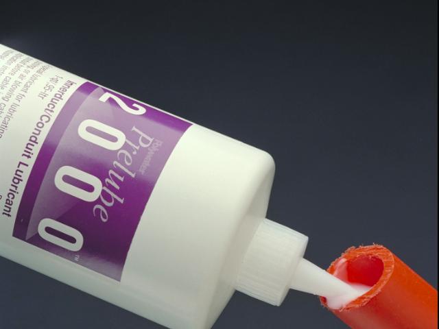 Close-up image of a white bottle labeled