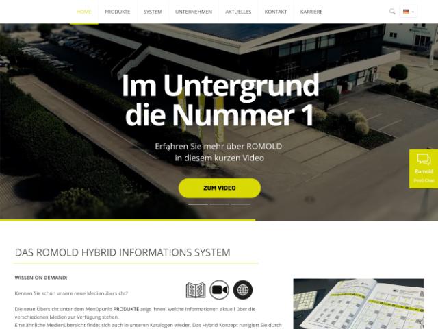 Screenshot of the ROMOLD company website homepage with aerial view of company headquarters. The headline